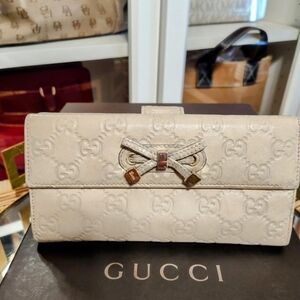 Gucci Beige Embossed Leather Wallet